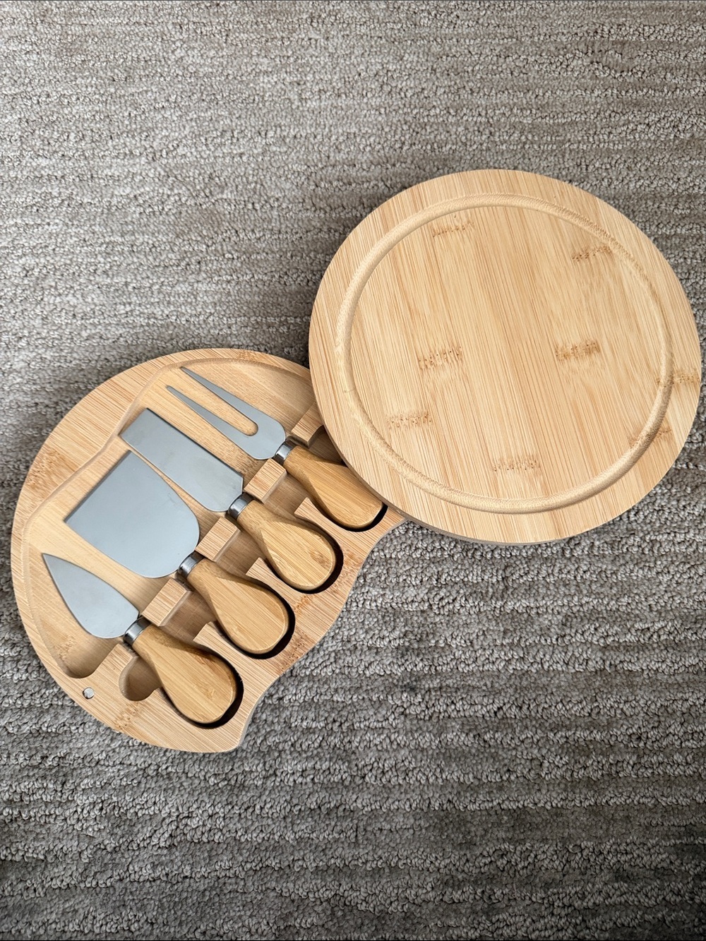 BRAND NEW - charcuterie wood board with hidden tools (8” diameter)